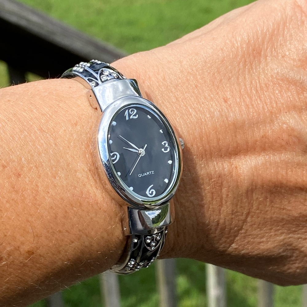 Quartz bracelet cuff Watch black with crystal embellished flowers